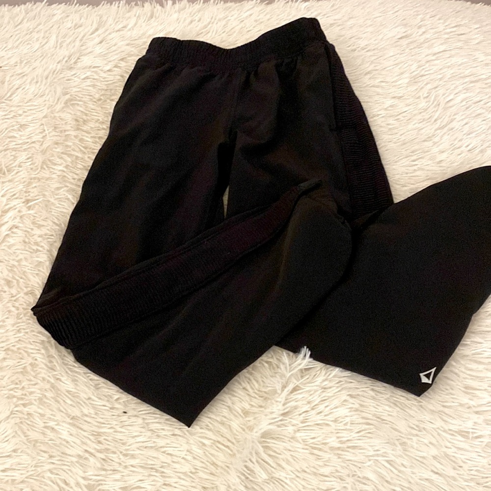 Ivivva garbage bag pants. Button detail on the bottom